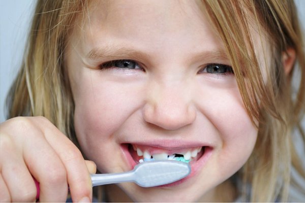 brushing teeth Twenty One dental clinic dentist Brighton Hove